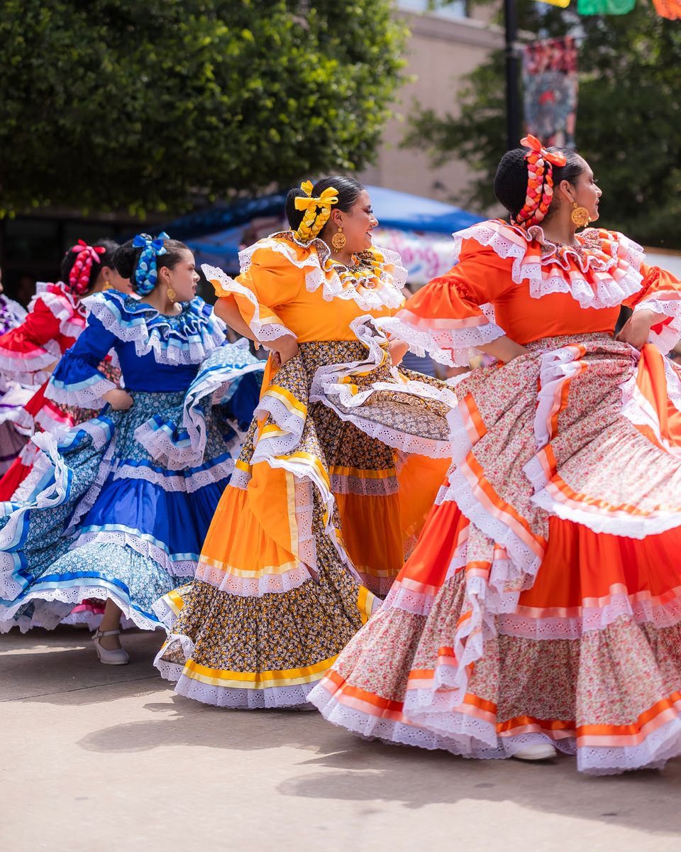 Ladies dance a traditional Mexican dance routine at the Cinco de Mayo Celebration held at the Dallas Farmers Market