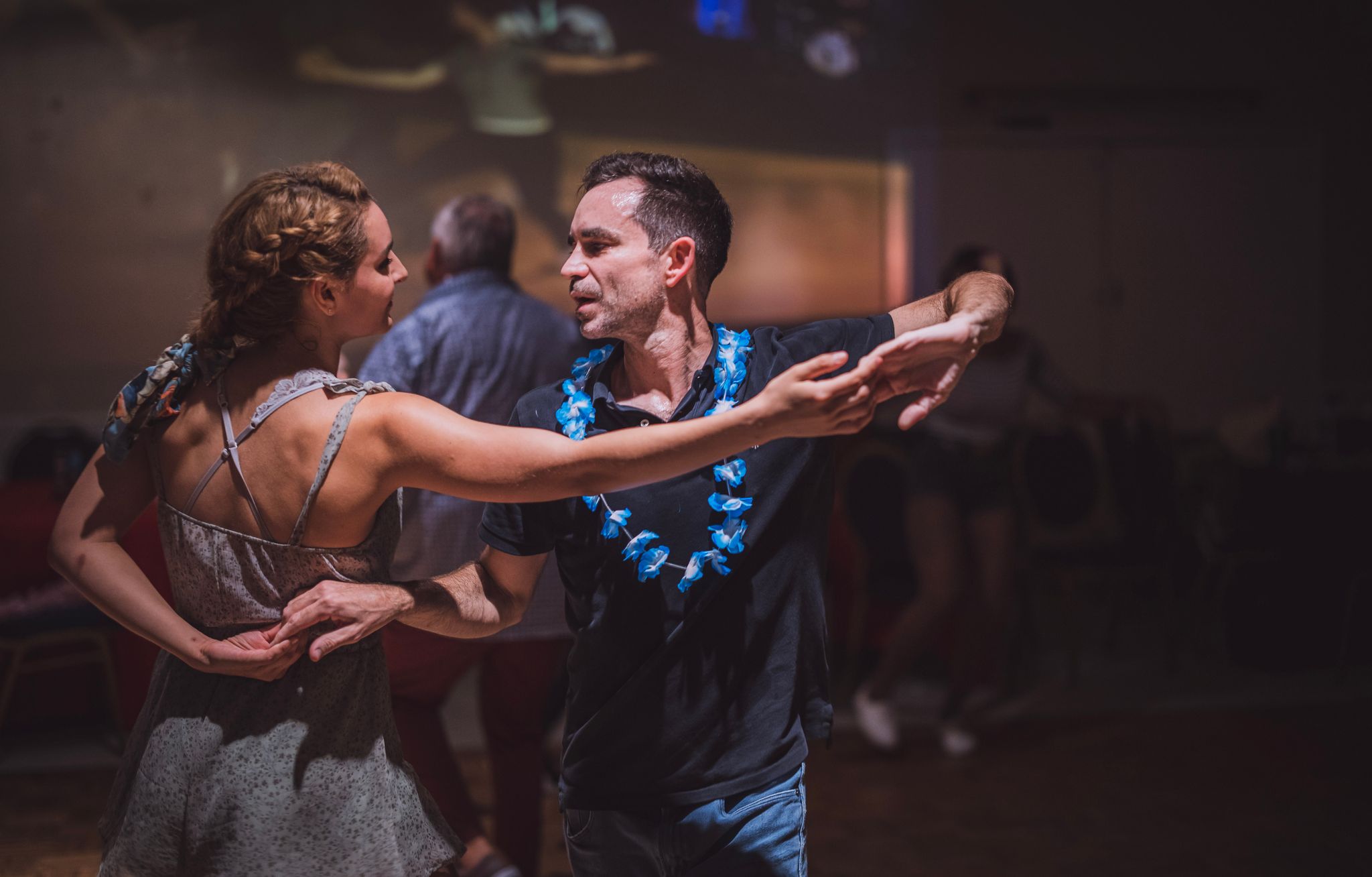 Two Lindy Hop dancers in the low light of Tampa's Torpedo Room