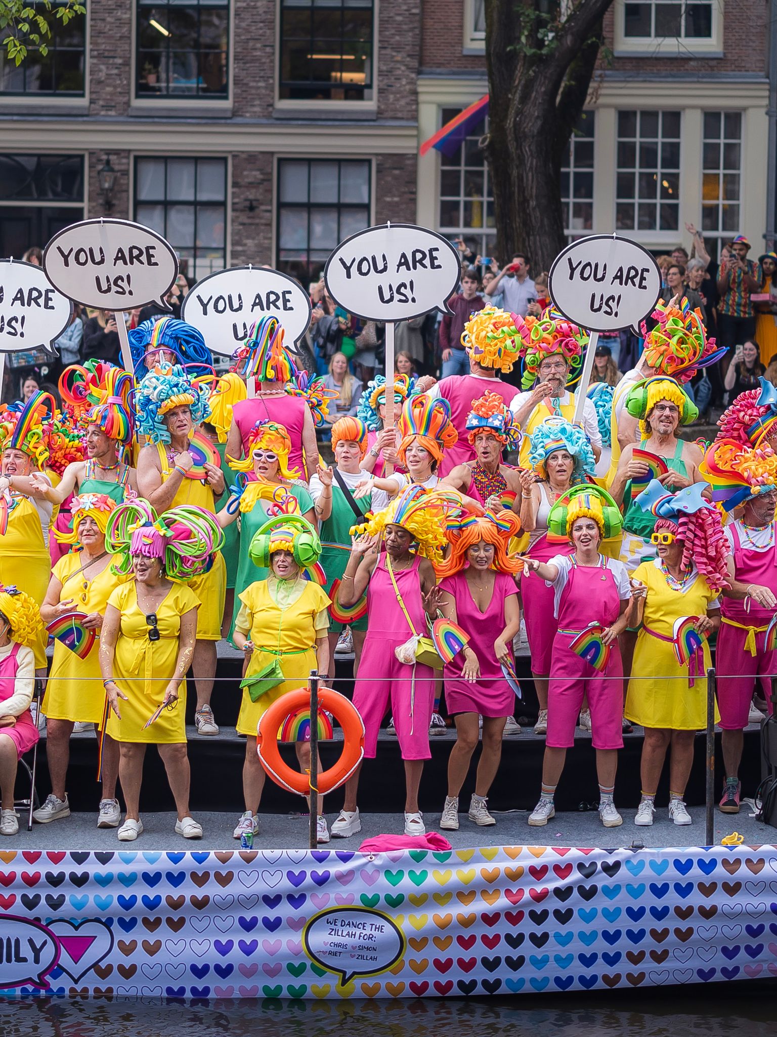 The Pride Parade is Amsterdam's second-largest event of the year, celebrating the LGBTQ+ community. This float, and others like it, share the vision that all people are welcome to experience family