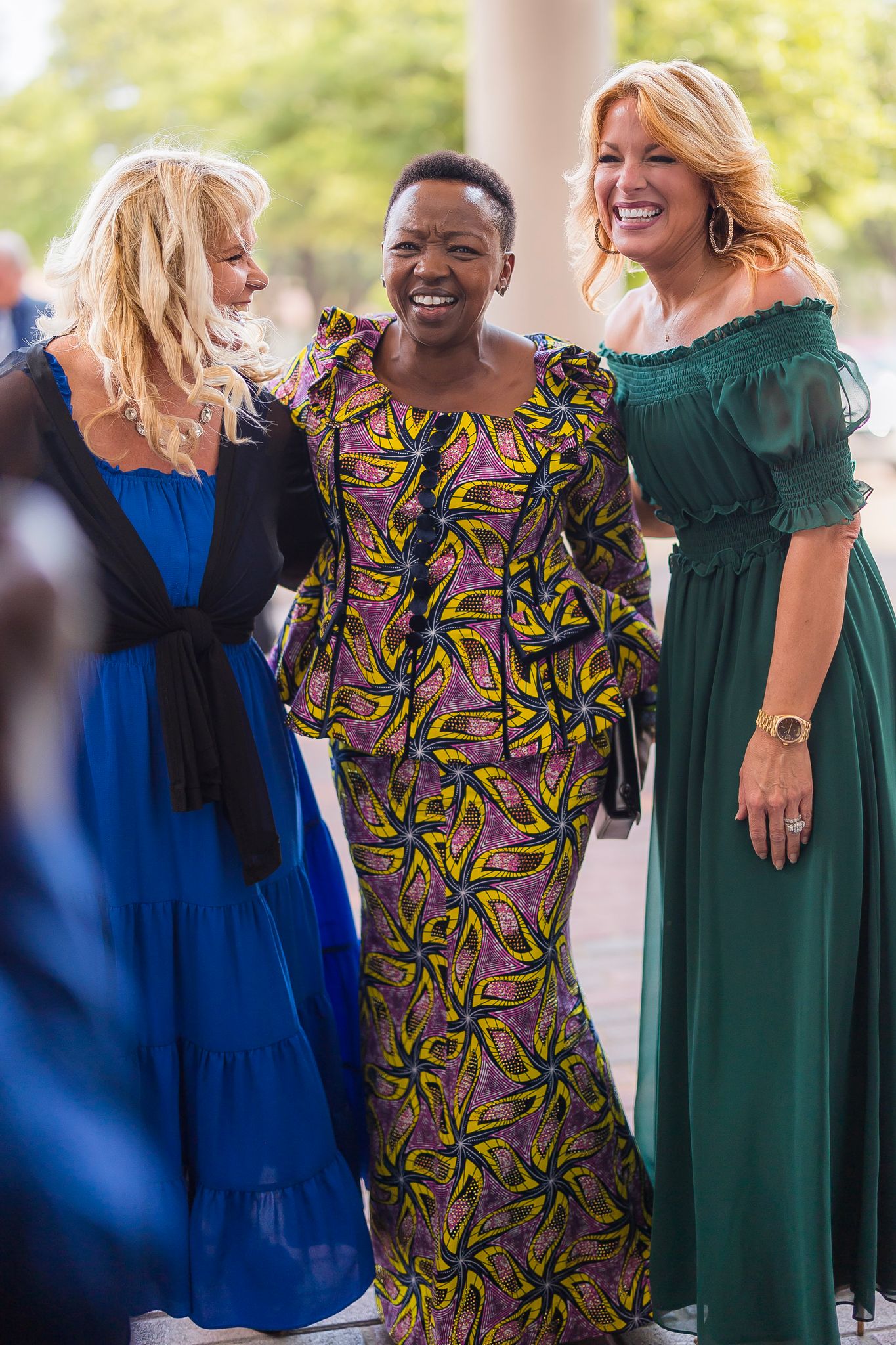 Sue Detweiler (left) and Tara Seidman (right) escort Her Excellency Rachel Ruto, the First Lady of Kenya (center)